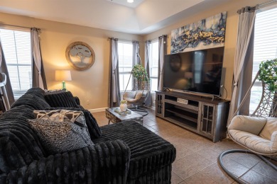 Bright and inviting 3-bedroom, 2.5-bath home with detached 2-car on Southwood Golf Club in Florida - for sale on GolfHomes.com, golf home, golf lot