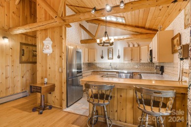 This rustic ranch, located w/in the exclusive Wolf Laurel on Wolf Laurel Country Club in North Carolina - for sale on GolfHomes.com, golf home, golf lot