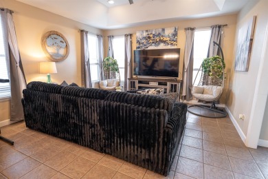 Bright and inviting 3-bedroom, 2.5-bath home with detached 2-car on Southwood Golf Club in Florida - for sale on GolfHomes.com, golf home, golf lot