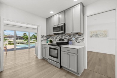 Tucked away in the prestigious waterfront enclave of Dana Shores on Rocky Point Golf Course in Florida - for sale on GolfHomes.com, golf home, golf lot