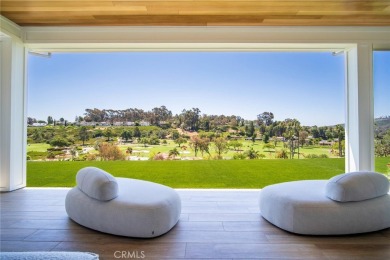 Rising above the prestigious El Niguel Country Club, this on El Niguel Country Club in California - for sale on GolfHomes.com, golf home, golf lot