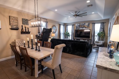 Bright and inviting 3-bedroom, 2.5-bath home with detached 2-car on Southwood Golf Club in Florida - for sale on GolfHomes.com, golf home, golf lot