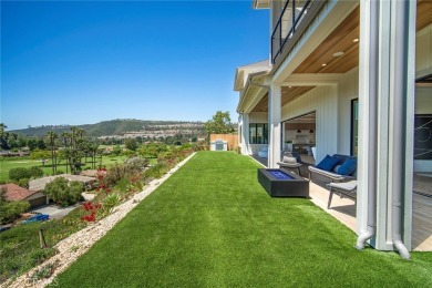 Rising above the prestigious El Niguel Country Club, this on El Niguel Country Club in California - for sale on GolfHomes.com, golf home, golf lot