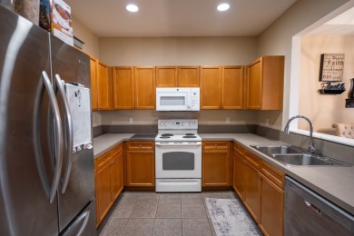 Bright and inviting 3-bedroom, 2.5-bath home with detached 2-car on Southwood Golf Club in Florida - for sale on GolfHomes.com, golf home, golf lot