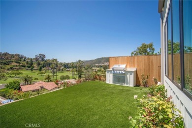 Rising above the prestigious El Niguel Country Club, this on El Niguel Country Club in California - for sale on GolfHomes.com, golf home, golf lot