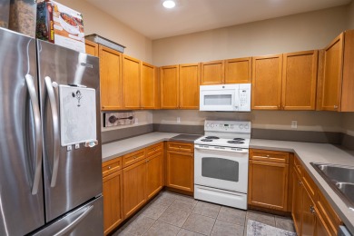 Bright and inviting 3-bedroom, 2.5-bath home with detached 2-car on Southwood Golf Club in Florida - for sale on GolfHomes.com, golf home, golf lot