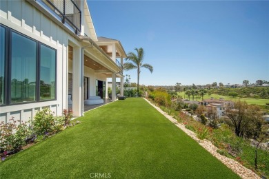 Rising above the prestigious El Niguel Country Club, this on El Niguel Country Club in California - for sale on GolfHomes.com, golf home, golf lot