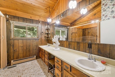 This rustic ranch, located w/in the exclusive Wolf Laurel on Wolf Laurel Country Club in North Carolina - for sale on GolfHomes.com, golf home, golf lot