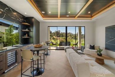 Rising above the prestigious El Niguel Country Club, this on El Niguel Country Club in California - for sale on GolfHomes.com, golf home, golf lot