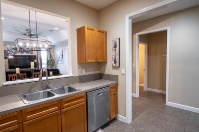 Bright and inviting 3-bedroom, 2.5-bath home with detached 2-car on Southwood Golf Club in Florida - for sale on GolfHomes.com, golf home, golf lot