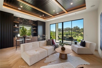 Rising above the prestigious El Niguel Country Club, this on El Niguel Country Club in California - for sale on GolfHomes.com, golf home, golf lot