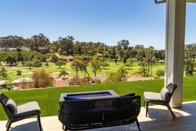 Rising above the prestigious El Niguel Country Club, this on El Niguel Country Club in California - for sale on GolfHomes.com, golf home, golf lot
