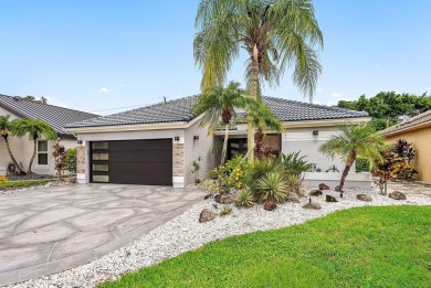 Nestled on a quiet cul-de-sac street in the prestigious Boca on  in Florida - for sale on GolfHomes.com, golf home, golf lot