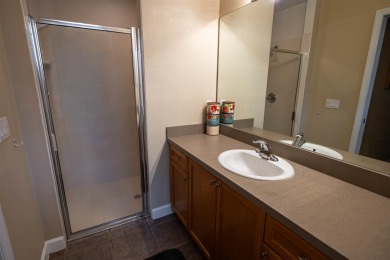 Bright and inviting 3-bedroom, 2.5-bath home with detached 2-car on Southwood Golf Club in Florida - for sale on GolfHomes.com, golf home, golf lot