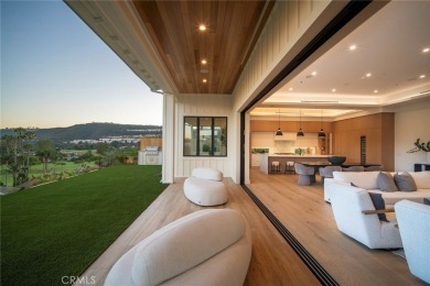 Rising above the prestigious El Niguel Country Club, this on El Niguel Country Club in California - for sale on GolfHomes.com, golf home, golf lot