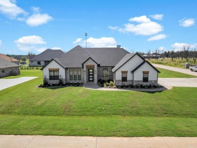 Experience refined living in the exclusive, guard-gated on Pecan Plantation Country Club in Texas - for sale on GolfHomes.com, golf home, golf lot