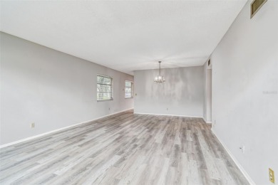You will be On Top of the World in this updated two bedroom two on On Top Of The World Golf Course in Florida - for sale on GolfHomes.com, golf home, golf lot