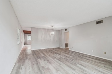 You will be On Top of the World in this updated two bedroom two on On Top Of The World Golf Course in Florida - for sale on GolfHomes.com, golf home, golf lot