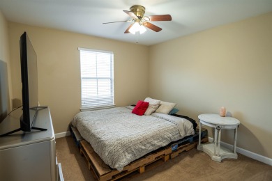Bright and inviting 3-bedroom, 2.5-bath home with detached 2-car on Southwood Golf Club in Florida - for sale on GolfHomes.com, golf home, golf lot
