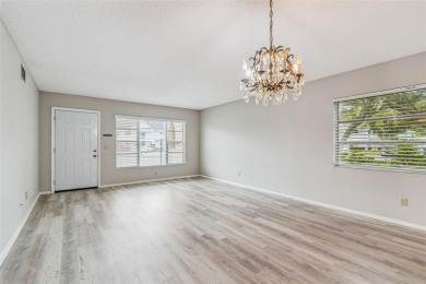 You will be On Top of the World in this updated two bedroom two on On Top Of The World Golf Course in Florida - for sale on GolfHomes.com, golf home, golf lot