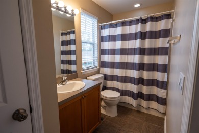 Bright and inviting 3-bedroom, 2.5-bath home with detached 2-car on Southwood Golf Club in Florida - for sale on GolfHomes.com, golf home, golf lot