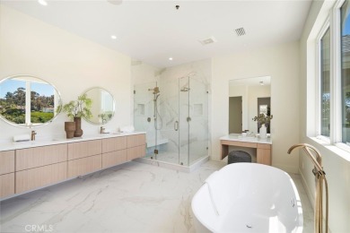Rising above the prestigious El Niguel Country Club, this on El Niguel Country Club in California - for sale on GolfHomes.com, golf home, golf lot