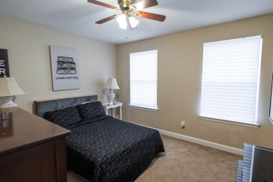 Bright and inviting 3-bedroom, 2.5-bath home with detached 2-car on Southwood Golf Club in Florida - for sale on GolfHomes.com, golf home, golf lot