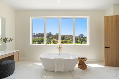 Rising above the prestigious El Niguel Country Club, this on El Niguel Country Club in California - for sale on GolfHomes.com, golf home, golf lot