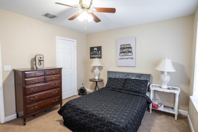 Bright and inviting 3-bedroom, 2.5-bath home with detached 2-car on Southwood Golf Club in Florida - for sale on GolfHomes.com, golf home, golf lot