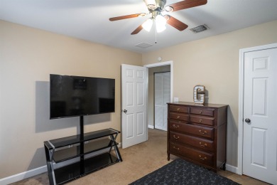 Bright and inviting 3-bedroom, 2.5-bath home with detached 2-car on Southwood Golf Club in Florida - for sale on GolfHomes.com, golf home, golf lot