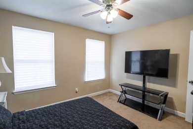 Bright and inviting 3-bedroom, 2.5-bath home with detached 2-car on Southwood Golf Club in Florida - for sale on GolfHomes.com, golf home, golf lot
