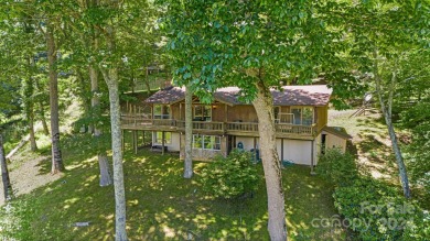 This rustic ranch, located w/in the exclusive Wolf Laurel on Wolf Laurel Country Club in North Carolina - for sale on GolfHomes.com, golf home, golf lot