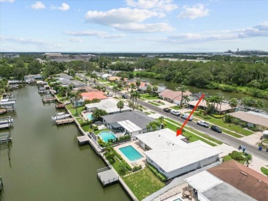 Tucked away in the prestigious waterfront enclave of Dana Shores on Rocky Point Golf Course in Florida - for sale on GolfHomes.com, golf home, golf lot