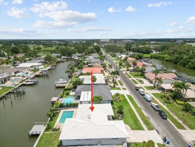 Tucked away in the prestigious waterfront enclave of Dana Shores on Rocky Point Golf Course in Florida - for sale on GolfHomes.com, golf home, golf lot