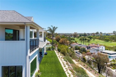 Rising above the prestigious El Niguel Country Club, this on El Niguel Country Club in California - for sale on GolfHomes.com, golf home, golf lot