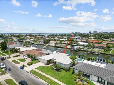 Tucked away in the prestigious waterfront enclave of Dana Shores on Rocky Point Golf Course in Florida - for sale on GolfHomes.com, golf home, golf lot