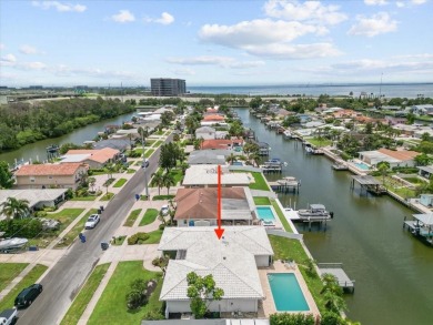 Tucked away in the prestigious waterfront enclave of Dana Shores on Rocky Point Golf Course in Florida - for sale on GolfHomes.com, golf home, golf lot