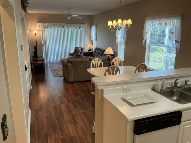 This immaculate 2nd-floor condo in the highly sought-after River on River Oaks Golf Plantation  in South Carolina - for sale on GolfHomes.com, golf home, golf lot