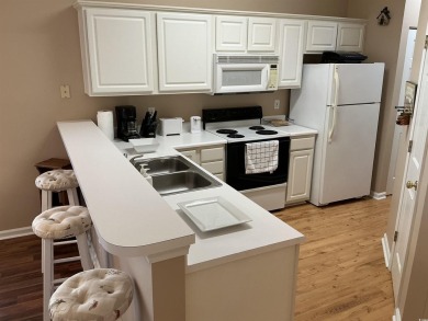This immaculate 2nd-floor condo in the highly sought-after River on River Oaks Golf Plantation  in South Carolina - for sale on GolfHomes.com, golf home, golf lot