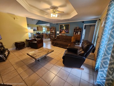 This charming 3-bedroom, 2-bath home offers the perfect blend of on Bayou Country Club in Louisiana - for sale on GolfHomes.com, golf home, golf lot