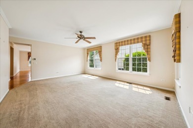 This beautifully maintained home in Crest Hill's Carillon Lakes on Carillon Lakes 3 Hole Course in Illinois - for sale on GolfHomes.com, golf home, golf lot