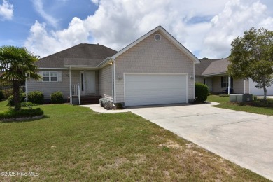 A Beautiful three bedroom, two bath home  with fenced back yard on Masonboro Country Club in North Carolina - for sale on GolfHomes.com, golf home, golf lot