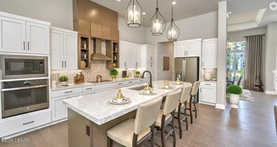 BRAND NEW CONSTRUCTION located on a picturesque lake in the on Plantation Bay Golf and Country Club in Florida - for sale on GolfHomes.com, golf home, golf lot