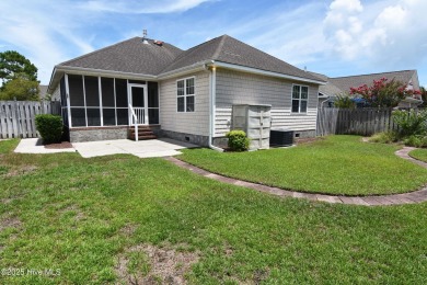 A Beautiful three bedroom, two bath home  with fenced back yard on Masonboro Country Club in North Carolina - for sale on GolfHomes.com, golf home, golf lot