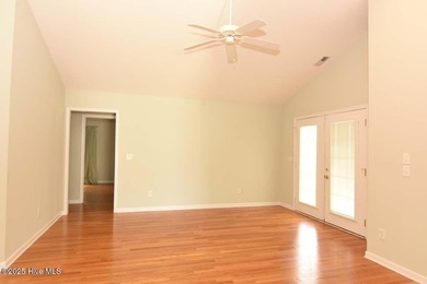 A Beautiful three bedroom, two bath home with fenced back yard on Masonboro Country Club in North Carolina - for sale on GolfHomes.com, golf home, golf lot