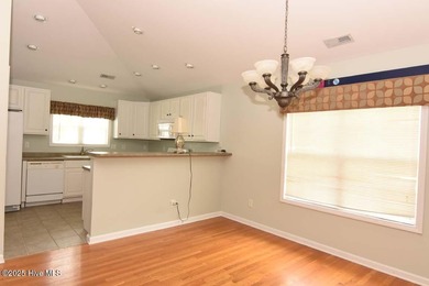 A Beautiful three bedroom, two bath home with fenced back yard on Masonboro Country Club in North Carolina - for sale on GolfHomes.com, golf home, golf lot