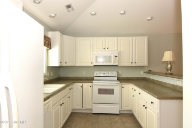 A Beautiful three bedroom, two bath home  with fenced back yard on Masonboro Country Club in North Carolina - for sale on GolfHomes.com, golf home, golf lot