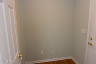 A Beautiful three bedroom, two bath home  with fenced back yard on Masonboro Country Club in North Carolina - for sale on GolfHomes.com, golf home, golf lot