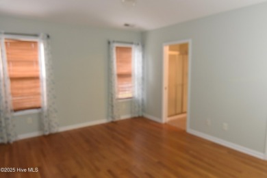 A Beautiful three bedroom, two bath home  with fenced back yard on Masonboro Country Club in North Carolina - for sale on GolfHomes.com, golf home, golf lot
