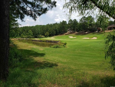 Golf course lot in a subdivision of newly built homes. Slopes on Granada Golf Course in Arkansas - for sale on GolfHomes.com, golf home, golf lot